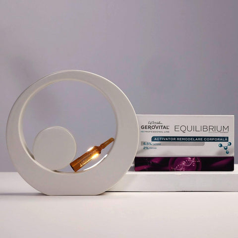 Gerovital Body Sculpting Activator ampoule in circular white sculpture beside its box