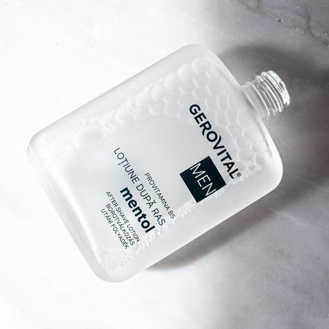 Open Gerovital Men Menthol After-Shave Lotion bottle covered in droplets