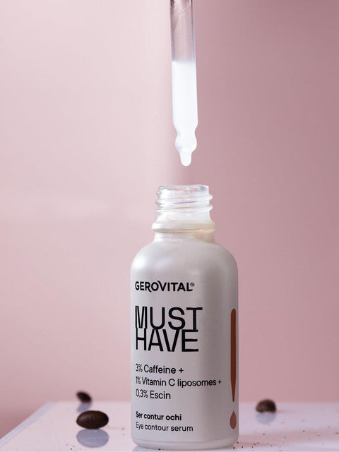 Open Gerovital Must Have Eye Contour Serum bottle with dropper and coffee beans