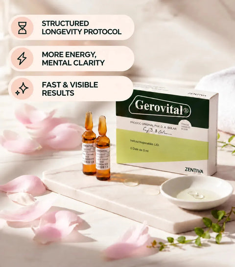 Gerovital GH3 anti-aging injectable vials and product box on a marble tray with pink flower petals.