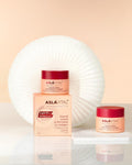 Two Aslavital Collagen Anti-Wrinkle and Firming Cream jars beside box and white ring