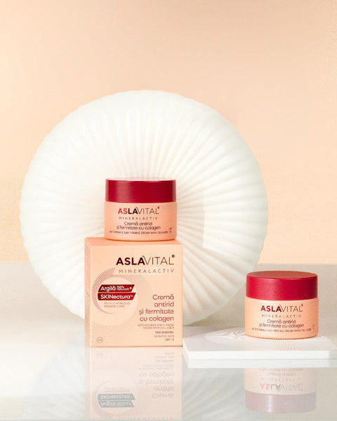 Two Aslavital Collagen Anti-Wrinkle and Firming Cream jars beside box and white ring