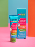 Gerovital Acne Stop Sebum Control Cream Gel tube and box on a pink surface with colorful blocks