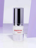 Gerovital H3 Derma+ Anti-Wrinkle Eye Contour Cream dispenser with silver cap against purple panels