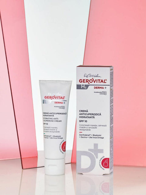 Gerovital Hydrating Anti-Couperose Cream SPF 10 tube and box against pink panels