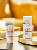 Gerovital Kids Sunscreen Cream SPF 50 tube and box on gold-colored trays