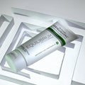 Gerovital Equilibrium Derma-Repair Cream tube lying on white square frames