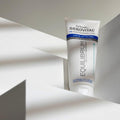 Gerovital Equilibrium Extreme Lift Neck and Cleavage Cream tube among white curves