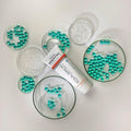 Gerovital Equilibrium Intense Hydration Cream tube among dishes with turquoise beads