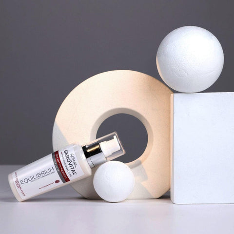 Gerovital Equilibrium Anti-Redness Serum bottle leaning beside white geometric shapes