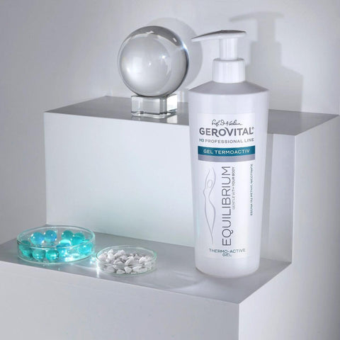Gerovital Equilibrium Thermo-Active Gel bottle beside clear sphere and glass dishes
