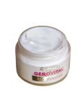 Open Gerovital H3 Evolution cream jar showing the white cream on a gold-colored surface