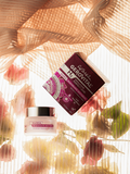 Gerovital Overnight Regenerating Mask jar and box arranged with flowers and sheer fabric