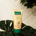 Gerovital Hair Expert Petroleum Intense Regenerating Hair Mask tube on green leaves