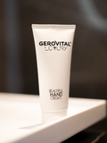 Gerovital Luxury Beautiful Hand Cream tube on a white surface against black