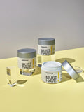 Three Gerovital Must Have sorbet cream jars arranged on clear blocks against yellow