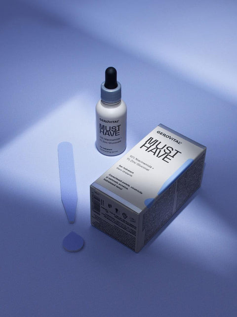 Gerovital Must Have Moisturising Serum bottle and box beside a clear decorative shape
