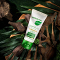 Gerovital Plant CC Cream Medium tube resting on wood among leaves